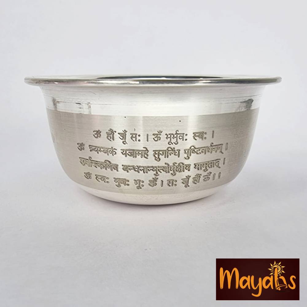 Anointed Silver Bowl with Mahamrityunjay Mantra engraved on it.