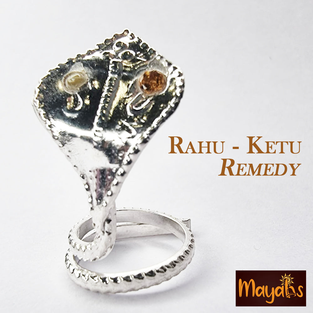 Silver snake embedded with gemstone of Rahu and Ketu – Mayahs